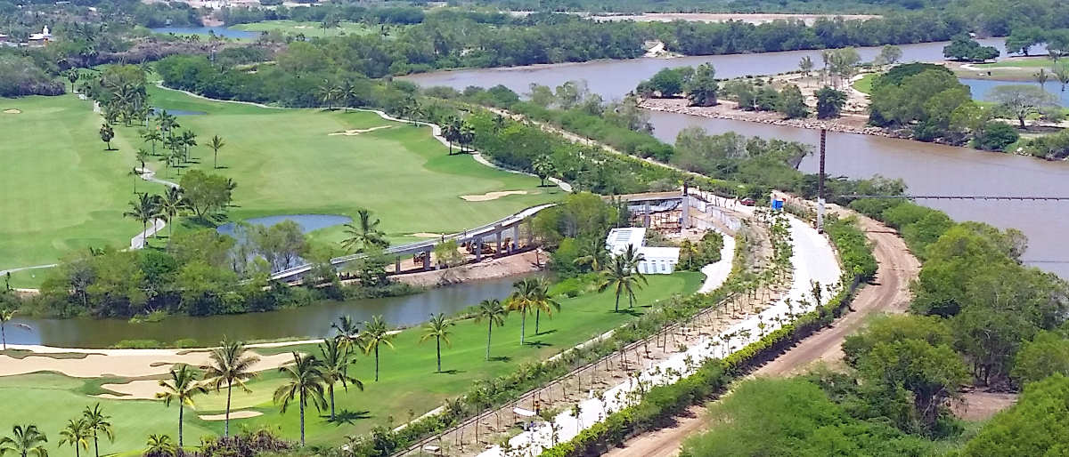 The Greg Norman golf course at Grupo Vidanta's Nuevo Vallarta, Mexico property is across the Ameca River from the primary side of the property.  Access to the Greg Norman golf course is over a new suspension bridge.  This image shows where the bridge is located relative to the Residence Tower at Grupo Vidanta's property at Nuevo Vallarta, Mexico.