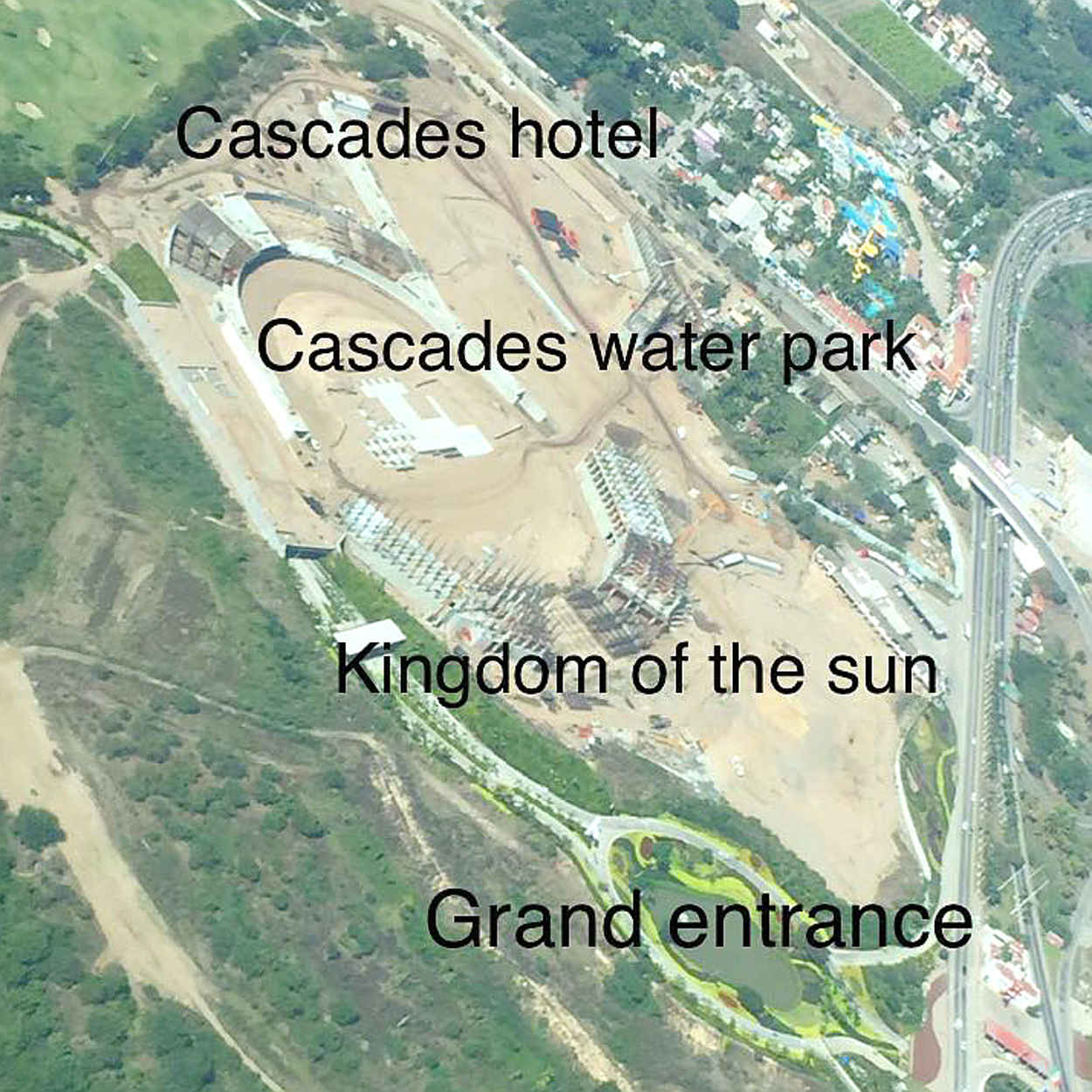 There may be two hotels under construction: Cascades and Kingdom of the Sun.  According to the image, the water park may be between the two hotels.