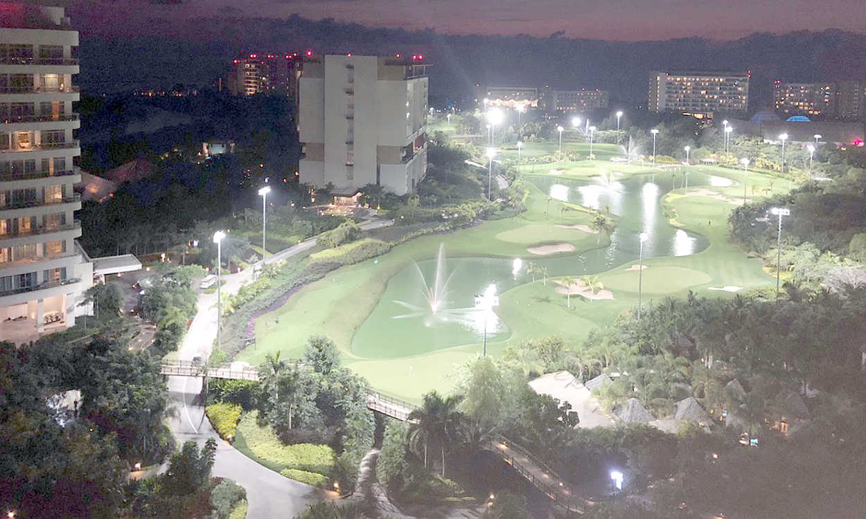The Lakes Course at night.