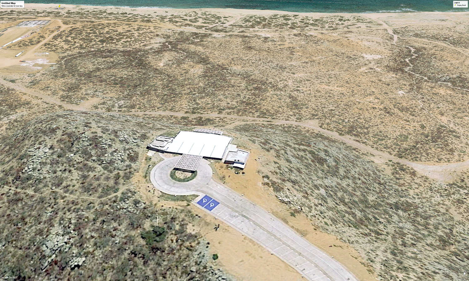 This image provides an impression of the topography looking from west to east, looking at the new sales office.  The beach is at the top of the photo. Tap the image to expand - tap your browser's back arrow to return to the page.